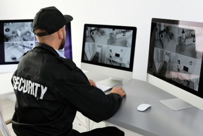 security personnel checking CCTV footage