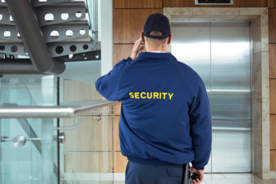 security man walking around the building